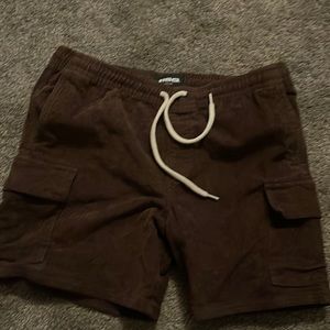 brown jean shorts with pockets on the side brand name rsq size medium in men’s